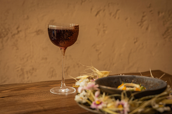 Wine glass and plate at Sino